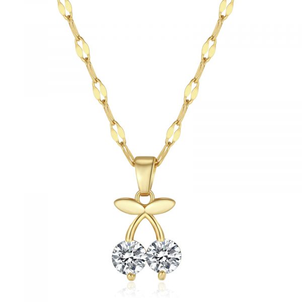 Gold cherry necklace with sparkling cubic zirconia stones on a white background